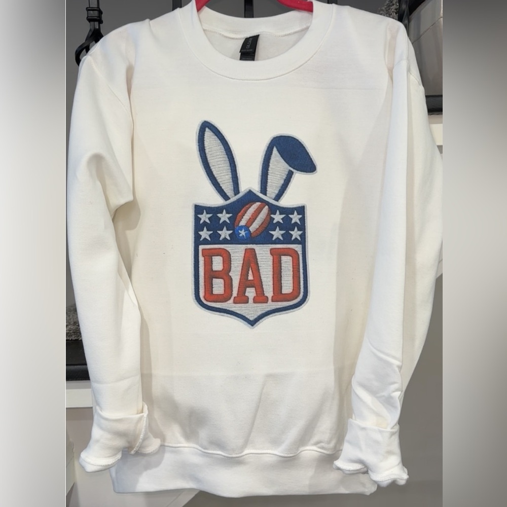 White Sweatshirt with Bad Bunny NFL Badge Design